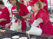 Lory Cato prepares pancakes for the Clark County Fair in Ridgefield on Friday morning. This is Lory’s fifth year cooking at the fair, which will run this year from Aug. 4-13 at the Clark County Event Center at the Fairgrounds.