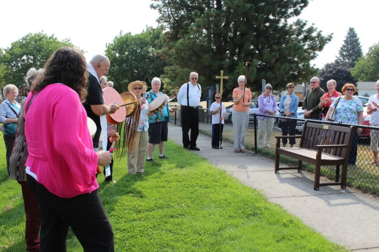 Lakeshore: Members of All Saints Episcopal Church and the Traveling Day Society’s drum and flute music for the dedication of the Dan Haase Memorial Soccer Fields in memory of the longtime supporter of soccer at the church.