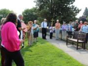 Lakeshore: Members of All Saints Episcopal Church and the Traveling Day Society’s drum and flute music for the dedication of the Dan Haase Memorial Soccer Fields in memory of the longtime supporter of soccer at the church.