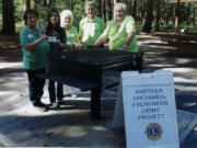 Orchards: Orchard’s Evergreen Lions Club Chairwoman Rosann Grzesiowski, from left, presents a plaque and barbecue to Karen Llewellyn, volunteer coordinator for the Clark County Public Works’ parks vision, along with Mary Jarson, secretary for the Lions, Jim Terrell, past president, and Jack Robbins, president.