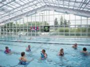 Swimmers participate in a deep-water fitness class at the Clark County Family YMCA in Vancouver. It’s the only full YMCA in the county, but groups in Ridgefield, Woodland and Battle Ground have all started the process to bring in YMCAs, and a group in east county has had preliminary discussions on looking into it.