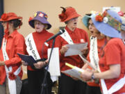 The Portland Raging Grannies, a social activist group, sing their testimony against the Vancouver Energy oil terminal at an Energy Facility Site Evaluation Council hearing Tuesday at Clark College at Columbia Tech Center.