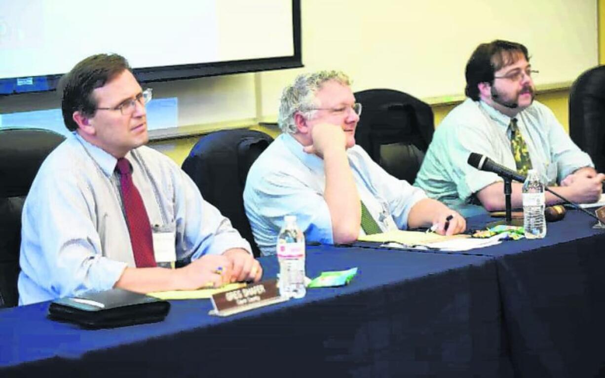 EFSEC Chairman Bill Lynch listens to testimony Tuesday during a hearing on the oil terminal in Vancouver.