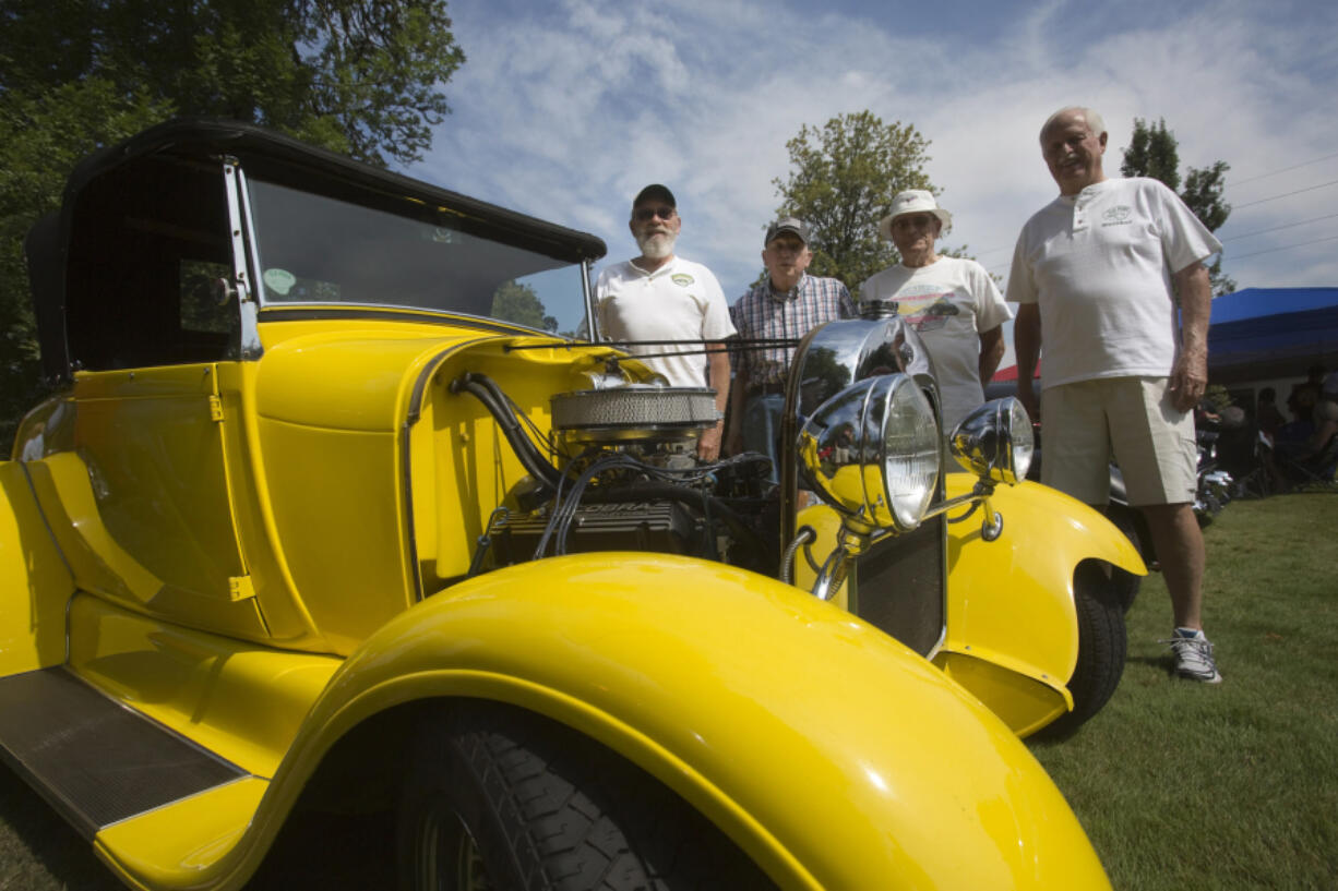 Slo Poks members Rudy Luepke, from left, Roger Porter, Ronald Stephens and Ken Moore founded the club in 1952, and on Sunday were some of the 150-plus guests at the club’s 65th anniversary celebration.