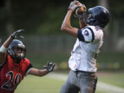 Michael Garrison (2) of King’s Way Christian pulls in the first of his three touchdown receptions in the Knights’ 56-0 win over Fort Vancouver.