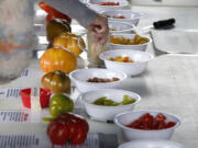 There are plenty of tasting samples at the Heirloom Tomato and Garlic Festival in Ridgefield.