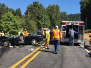 Firefighters, state troopers and paramedics respond to a two-vehicle crash that injured eight people north of Woodland Tuesday morning. The state patrol recommended charges of vehicular assault for the driver investigators say caused the crash.