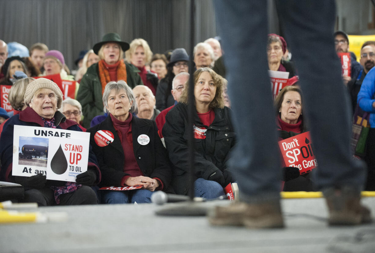 People opposed to the Vancouver Energy oil terminal project rally at a hearing in Vancouver in January 2016. On Monday, the Astoria (Ore.) City Council unanimously passed a resolution that specifically cited the proposed Tesoro Corp. and Savage Cos. terminal as a reason to oppose any proposed oil-by-rail projects along the Columbia River.