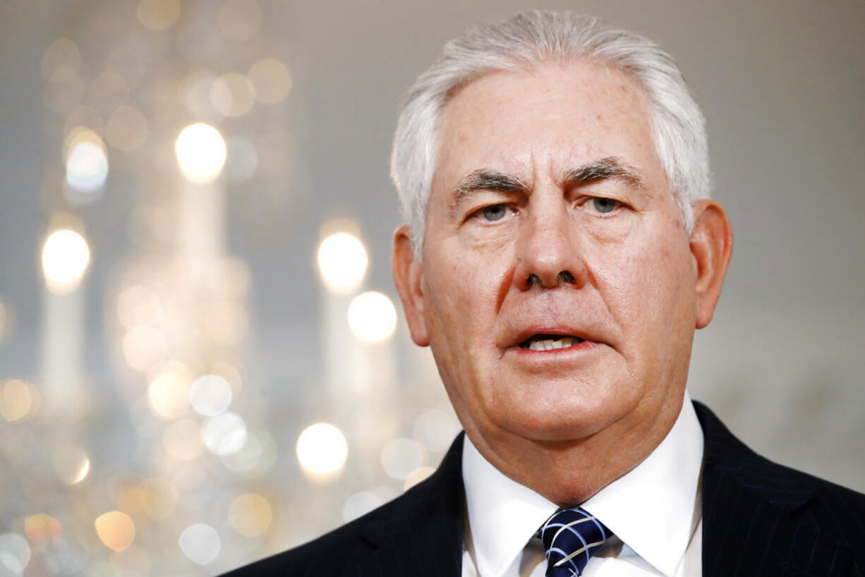 FILE - In this July 21, 2017 file photo, Secretary of State Rex Tillerson speaks at the State Department in Washington. Tillerson says neither he nor President Donald Trump is "very happy" about new sanctions on Russia that Congress has voted to put in place.