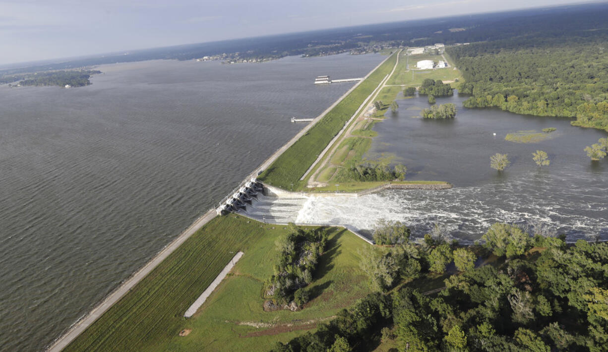 Water is released from Lake Conroe Tuesday, Aug. 29, 2017, in Conroe, Texas. (AP Photo/David J.