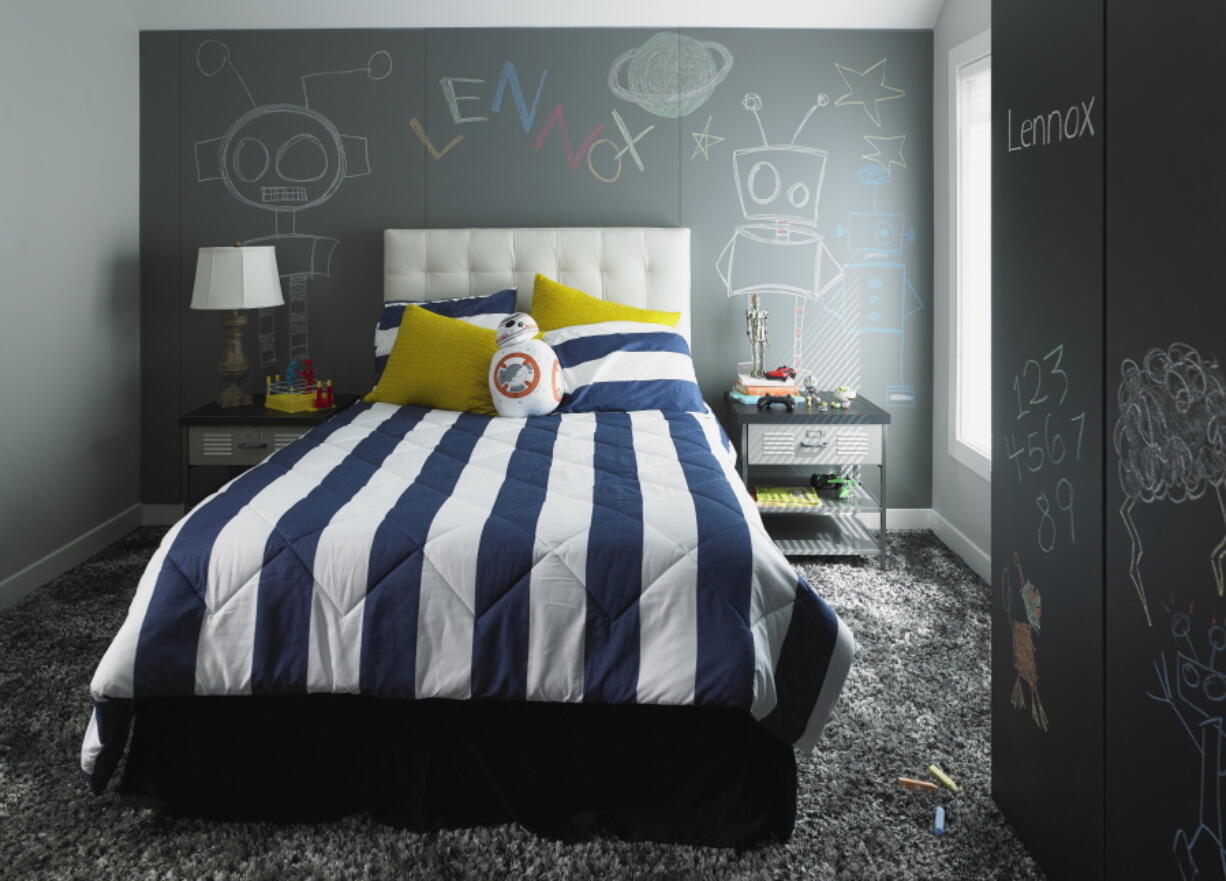 A child’s bedroom includes the new Formica Writable Surfaces in the Black ChalkAble design and the Gray ChalkAble design.
