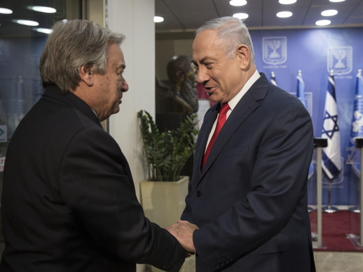 Prime Minister Benjamin Netanyahu, right, and U.N. Secretary-General Antonio Guterres shake hands before a press conference at the Prime Minister’s Office in Jerusalem, Monday , Aug.28, 2017.