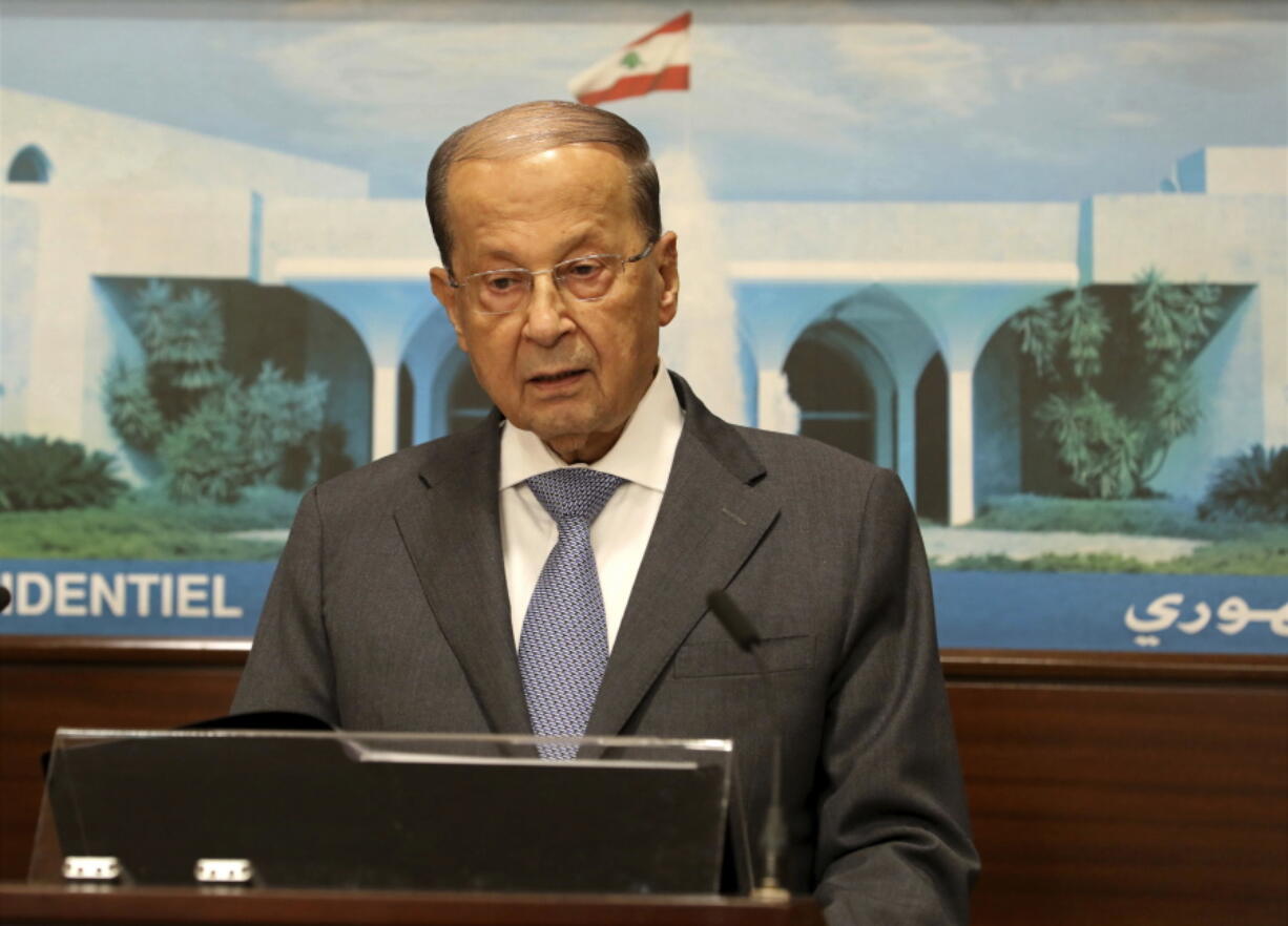 Lebanese President Michel Aoun, speaks to journalists at the Presidential Palace in Baabda, east of Beirut, Lebanon, Wednesday. Aoun declared victory against the Islamic State group Wednesday in a live statement praising the Lebanese army for carrying out the operation that ended with the deal to evacuate IS fighters and their families in return for information about nine troops who were kidnapped by IS in August 2014.