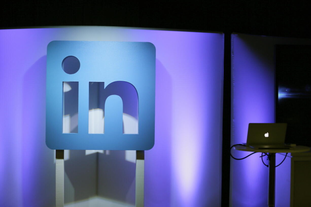 FILE - In this Thursday, Sept. 22, 2016, file photo, the LinkedIn logo is displayed during a product announcement in San Francisco. On Monday, Aug. 14, 2017, a federal judge ordered LinkedIn to stop blocking startup firm hiQ Labs, Inc. from scraping LinkedIn personal profiles for data.