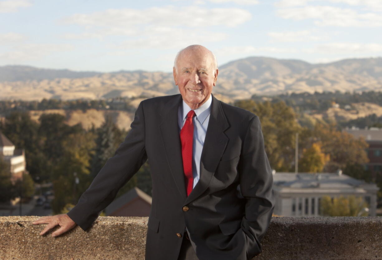 CORRECTS MIDDLE NAME AND DATE OF DEATH FILE - FILE - In this Oct. 14, 2001, file photo, former Interior Secretary Cecil D. Andrus poses for a photo at his office in Boise, Idaho. Andrus, who engineered the conservation of millions of acres of Alaska land during the Carter administration, has died. He was 85. Andrus died late Thursday,, Aug. 24, 2017 of complications from lung cancer, daughter Tracy Andrus said.