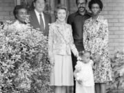 President Ronald Reagan and first lady Nancy Reagan stand with the Butler family on the front porch of the Butlers’ College Park, Md., home in 1982, five years after William Aitcheson, then a Ku Klux Klan “wizard,” burned a cross in the family’s lawn.