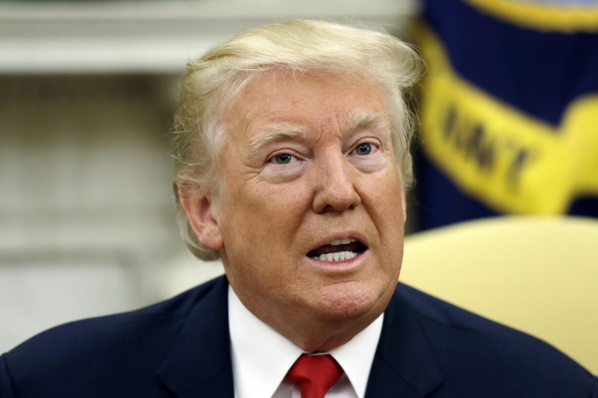 FILE - In this July 31, 2017, file photo, U.S. President Donald Trump speaks in the Oval Office in Washington. Of all the trade deals he lambasted on the campaign trail as threats to American workers, Trump reserved particular scorn for one: The North American Free Trade Agreement. Five days of talks aimed at overhauling NAFTA begin Wednesday, Aug. 16, 2017, in Washington, with negotiations to follow in Mexico and Canada.