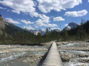 A bridge crosses a stream along the Iceline Trail in Yoho National Park in Canada’s stretch of the Rocky Mountains, straddling the border of British Columbia and Alberta. It is an outdoorsman’s paradise with scenic mountain hikes and crystal-blue water.