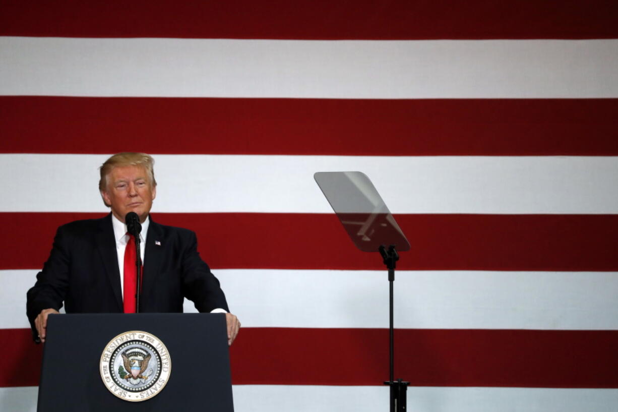 President Donald Trump pauses while speaking about on tax reform, Wednesday, Aug. 30, 2017, at the Loren Cook Company in Springfield, Mo.