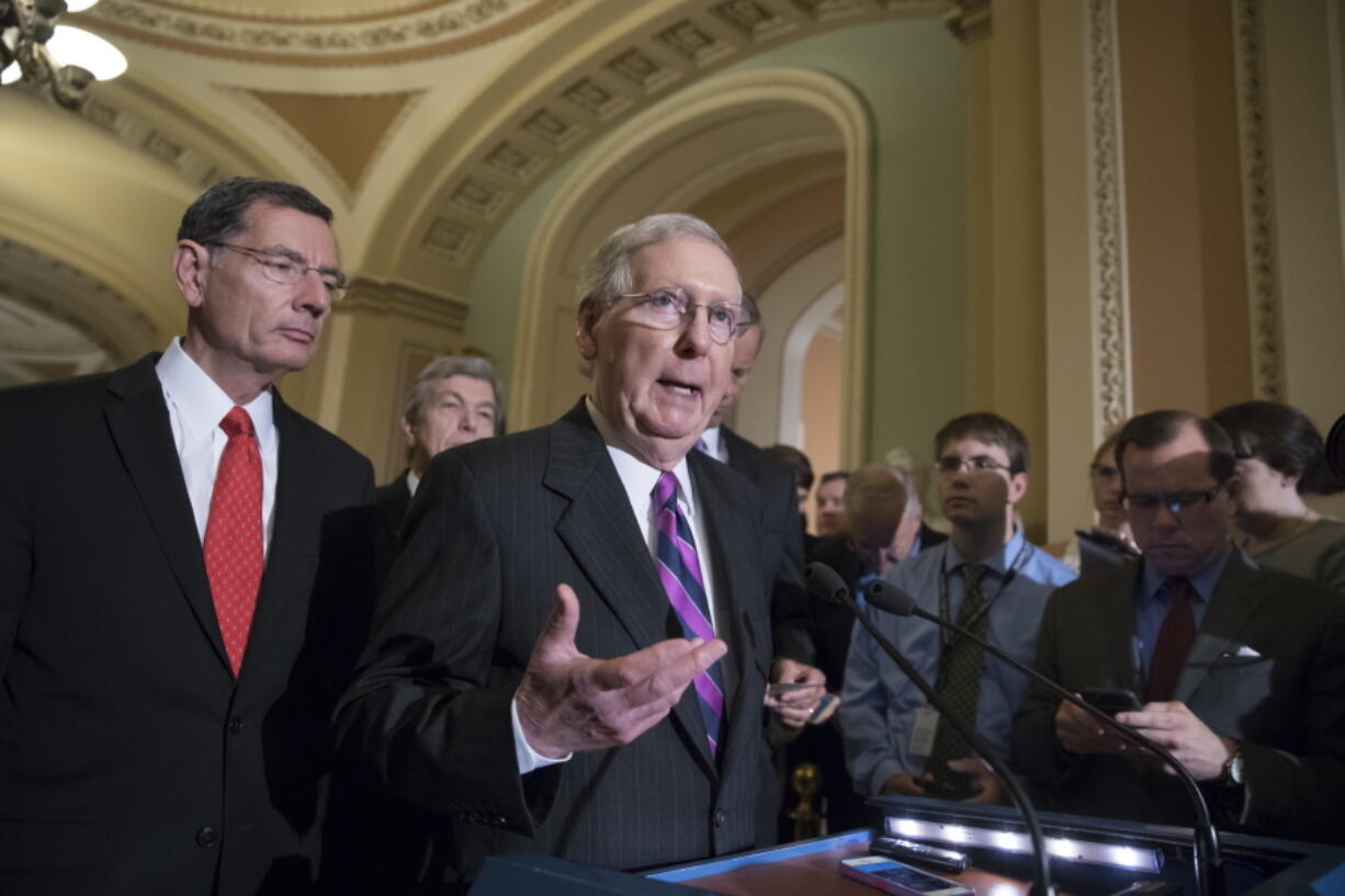 Senate Majority Leader Mitch McConnell of Ky., joined by, from left, Sen. John Barrasso, R-Wyo., and Sen. Roy Blunt, R-Mo., holds his first news conference since the Republican health care bill collapsed last week due to opposition within the GOP ranks Tuesday on Capitol Hill Washington. (AP Photo/J.