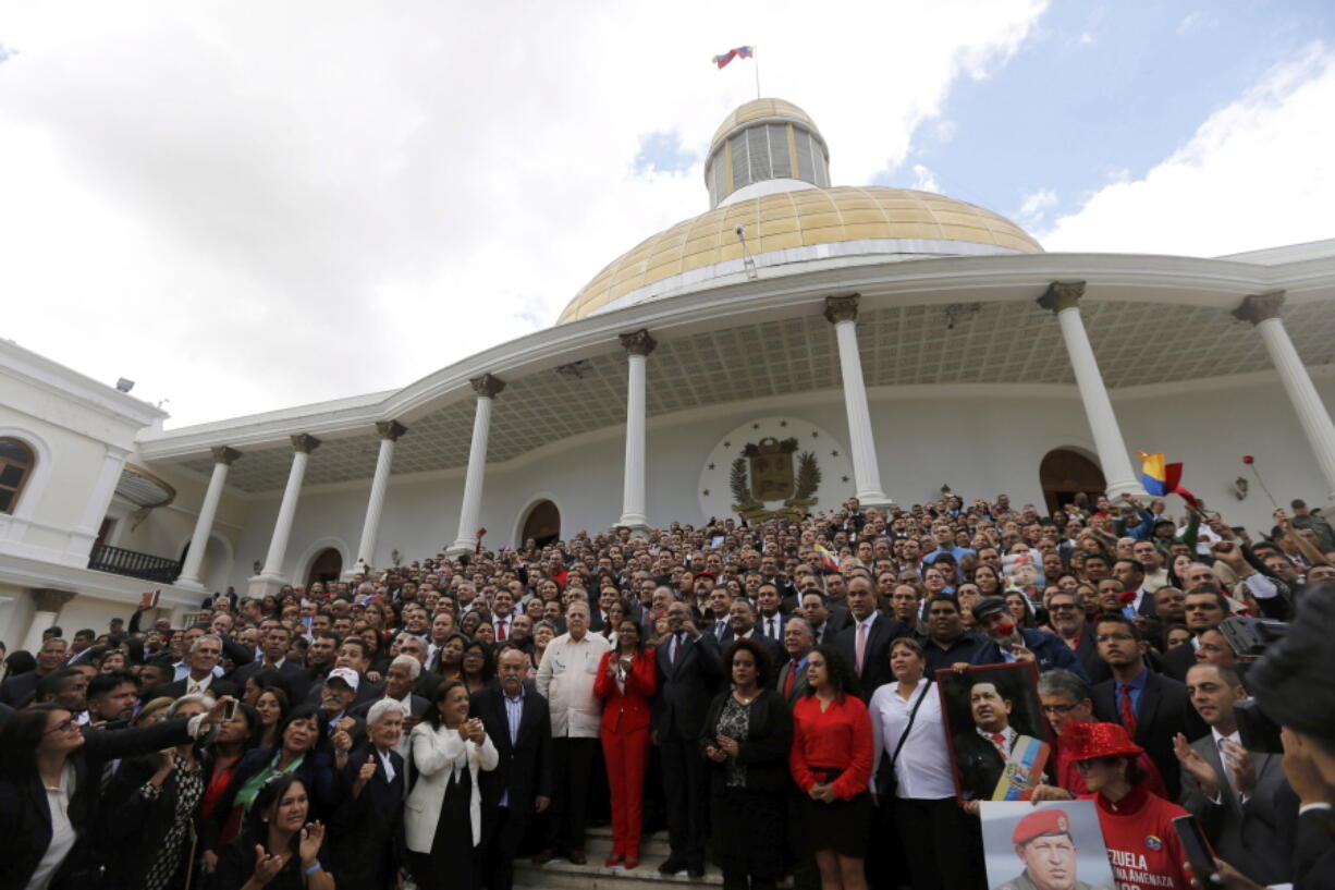 Venezuela’s Constitutional Assembly poses for an official photo after being sworn in, at the National Assembly in Caracas, Venezuela. The Constitutional Assembly is expected to meet again on Tuesday, Aug. 8, and despite growing international criticism, Venezuela’s President Nicolas Maduro has remained firm in pressing the body forward in executing his priorities.