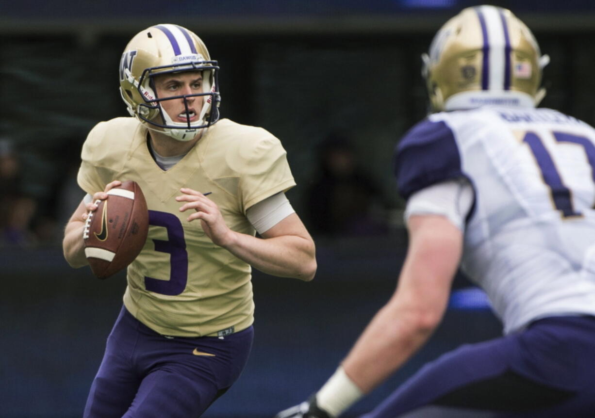 Washington quarterback Jake Browning (3).