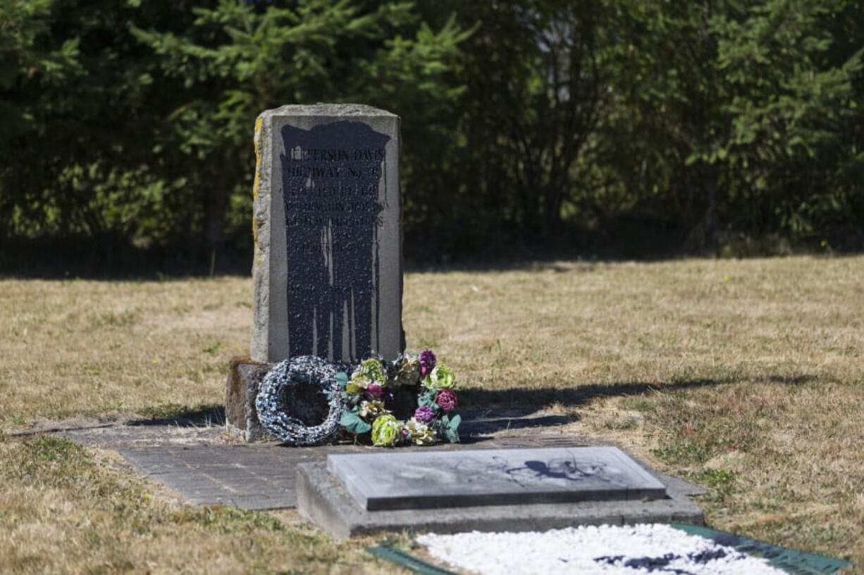 Jefferson Davis highway markers were vandalized at Jefferson Davis Park in Ridgefield last week, but the group that maintains the site said they have no plans to take them down or remove them.