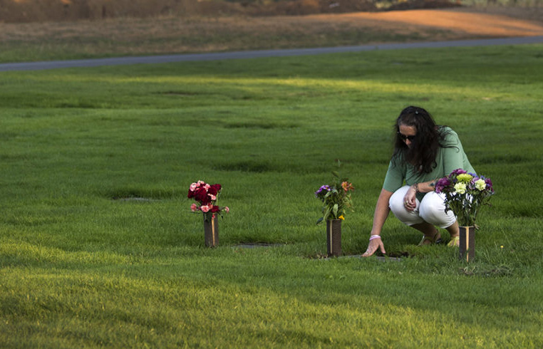 Ann Bucklin visits daughter Heidi's gravestone at Evergreen Memorial Gardens in Vancouver on Tuesday. Ann's daughter Heidi died by suicide six years ago on May 23, 2011. "I have no problem going, but it's always a little hard to leave," Ann said.