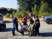 A man on a WaveRunner rescued a person who was close to drowning in the Cowlitz River Tuesday evening.