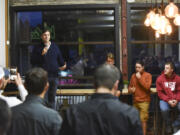 Eric Preisz of Graham Software Investments speaks to a crowd Tuesday night during Vancouver Tech Tours, an event that concluded at Columbia Collective. The event aimed to foster the tech community, which some say has been fragmented.