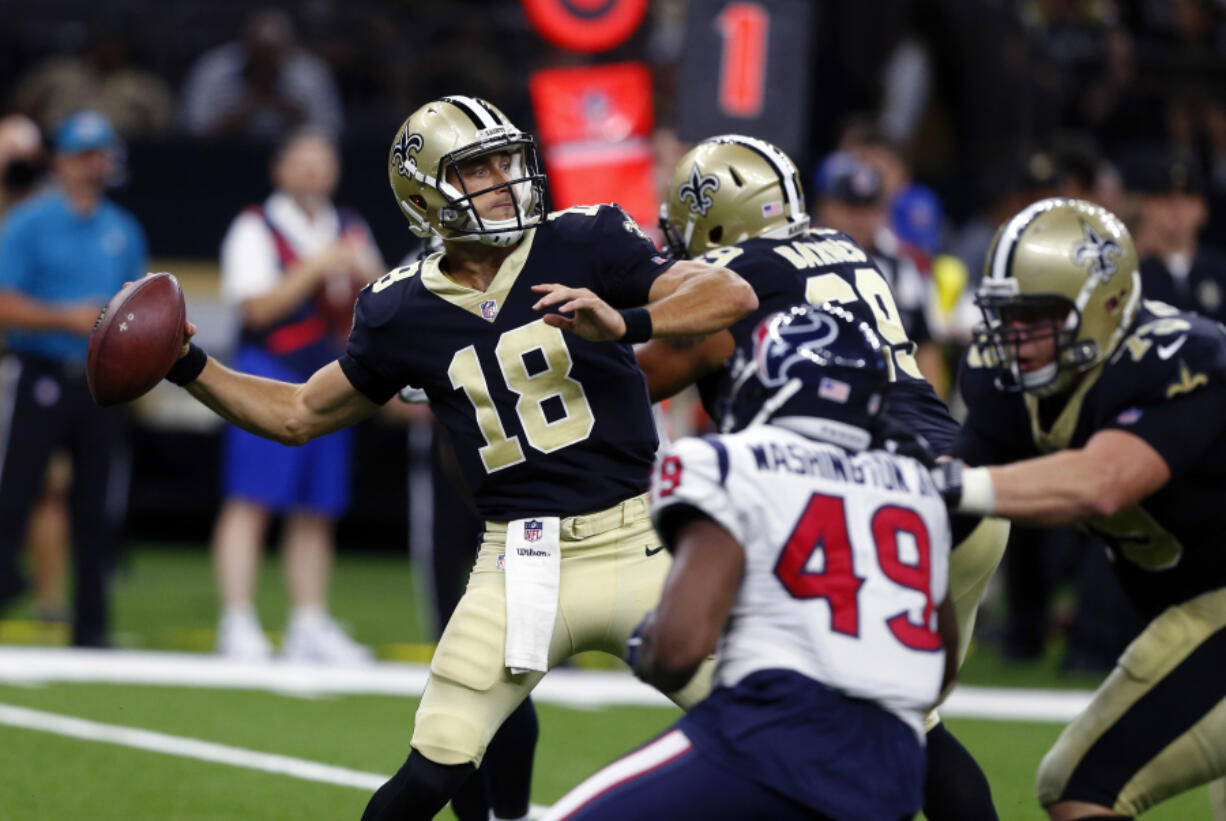 New Orleans Saints quarterback Garrett Grayson (18) passes in the second half of a preseason NFL football game against the Houston Texans in New Orleans, Saturday, Aug. 26, 2017.