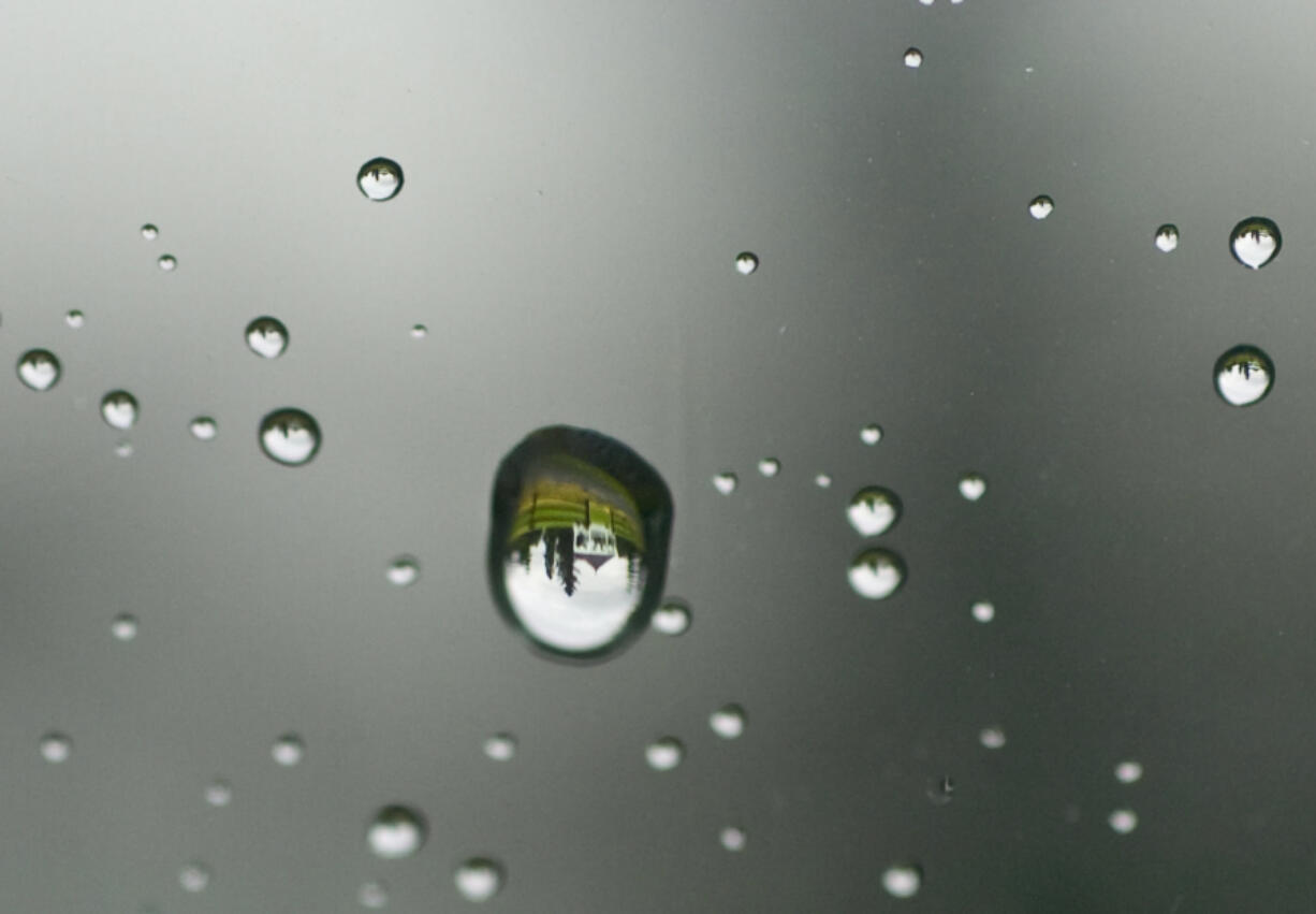 Light is refracted through raindrops on the windshield to reveal the bandstand along Old Soldiers Road in August 2008.