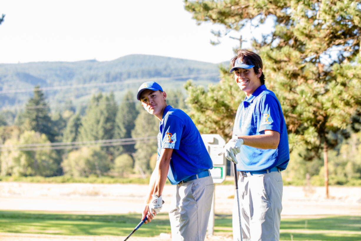 Cade Bringhurst, left, and brother Kellen Bringhurst are the top two on the Ridgefield High School golf team.