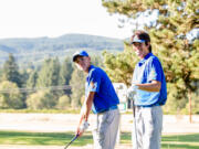 Cade Bringhurst, left, and brother Kellen Bringhurst are the top two on the Ridgefield High School golf team.