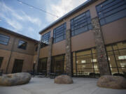 An outdoor common area at the Washougal School District’s new K-8 campus features string lights and boulders found during the construction process. The area also has tables so students can eat outside, or it can be used by teachers who want to take their classes outside.