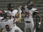 Camas player Ja'Michael Shelton (85) celebrates a touchdown vs. Central Catholic at Hillsboro Stadium.