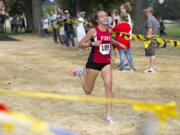 Fort Vancouver junior Emily Phelps (109) crosses the finish line with her eyes closed and a smile on her face in first place in the annual Run-A-Ree for varsity women's with a time of 18 minutes, 51 seconds at Hudson's Bay High School in Vancouver on Friday, Sept. 8, 2017.