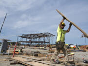 Anchor Concrete carpenter Aaron Ragsdale works at the construction site for Ridgefield School District’s new middle school campus. Construction is one of the fastest-growing industries in Clark County where incomes are on the rise.