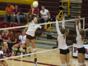 Prairie's Katie Vroman (6) jumps for a spike during Thursday's volleyball game against Camas at Prairie High School on Sept. 14, 2017. Prairie won all three sets against Camas.