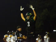 Evergreen receiver Nadil Hodzic celebrates after scoring a touchdown .