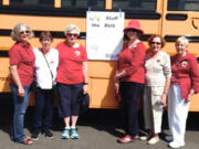 Battle Ground: Volunteers from the Battle Ground Education Foundation took shifts outside of various Wal-Mart entrances handing out a list of school supplies to shoppers and collected what they bought for the district’s Stuff the Bus event.