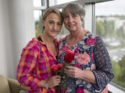 Brenda Eyman, left, and her mother, Linda Phimister, pause Monday after the annual Day of Remembrance ceremony, which honors homicide victims at the Clark County Public Service Center. Phimister’s daughter and Eyman’s sister, Janell Knight, was fatally shot in July 2016 in a triple homicide.