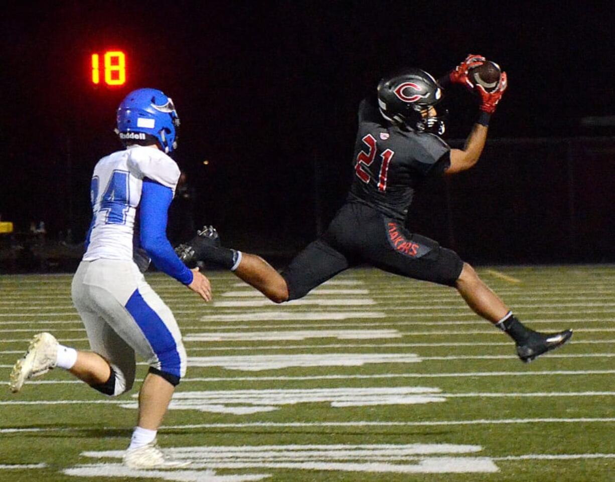 Camas receiver Drake Owen leaps for a reception against Coeur d’Alene at Doc Harris Stadium in Camas on Friday. Owen had two touchdown catches in the last 1:04, including the game-winner with 20 seconds left.