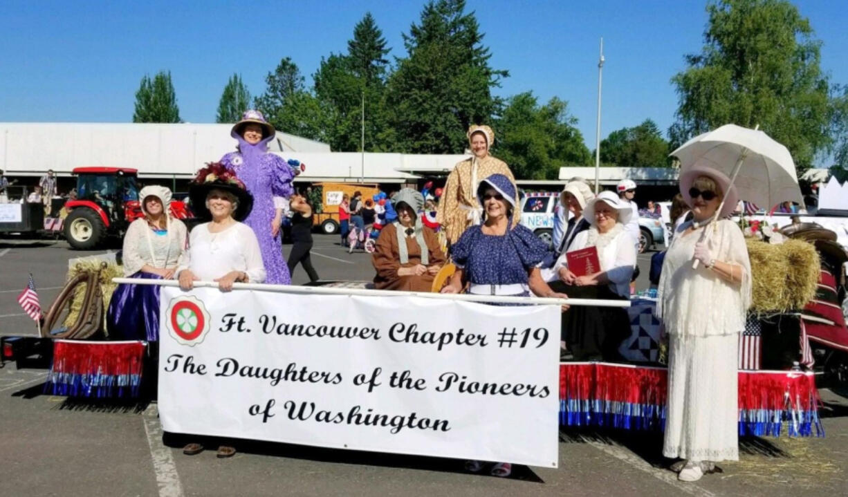 Battle Ground: Members of Daughters of the Pioneers of Washington and their float in Battle Ground Harvest Days, their first time riding a float in the event.