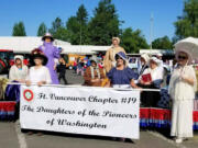 Battle Ground: Members of Daughters of the Pioneers of Washington and their float in Battle Ground Harvest Days, their first time riding a float in the event.