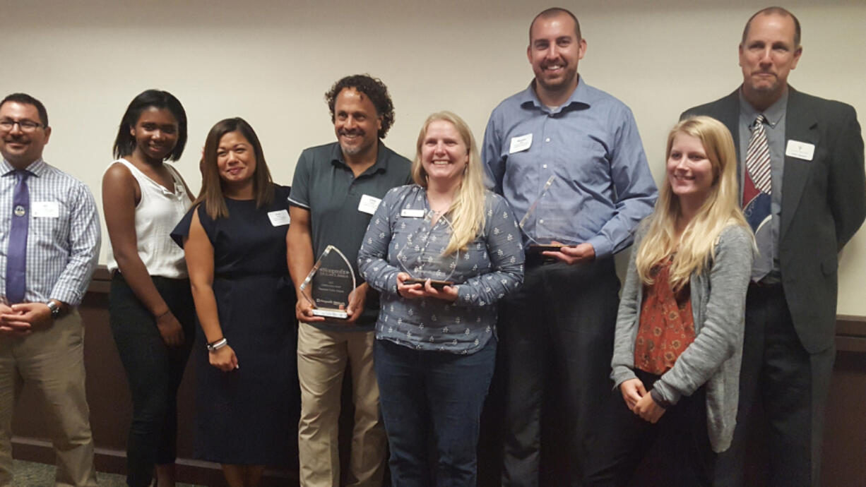 Esther Short: Representatives from the Police Activities League of Vancouver with the Collaboration Award from the Nonprofit Network of Southwest Washington.