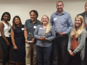 Esther Short: Representatives from the Police Activities League of Vancouver with the Collaboration Award from the Nonprofit Network of Southwest Washington.