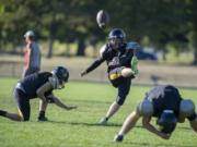 Kicker Nicholas Campbell says his close ties to holder AJ Schiefelbein, left, and long snapper Daniel Cantrell has been the key to the strong kicking game at Hudson’s Bay.