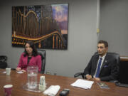 Vancouver City Council candidates Alishia Topper, incumbent, and Justin Forsman speak with members of The Columbian Editorial Board on Friday.