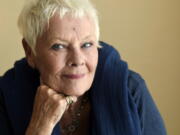 In this Sept. 11, 2017 photo, Judi Dench, a cast member in the film “Victoria and Abdul,” poses for a portrait during the Toronto International Film Festival in Toronto.